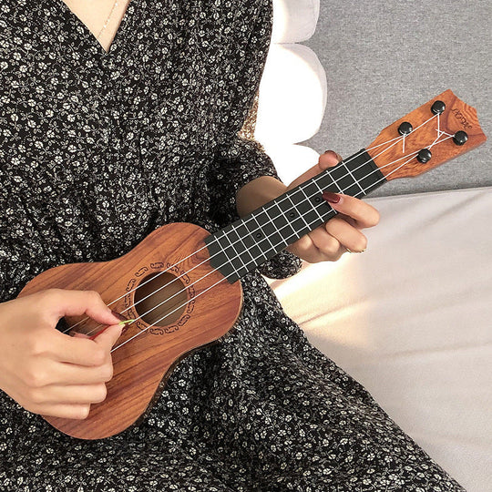 Mini Akustik-Ukulele Kompakt für Anfänger und Musiker 2