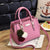 Damenhandtasche aus Leder mit Quaste