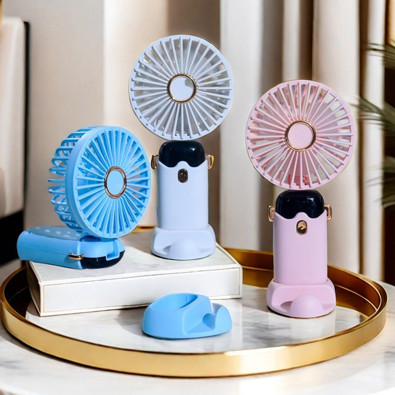 Tragbarer Handventilator mit Sprühfunktion für Damen 1