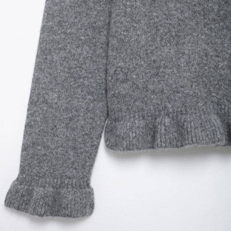 Stickad damkofta med struktur