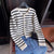 Gestreifte Damen-Strickjacke